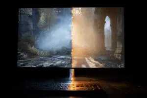 A glowing line fixing a torn image on a screen explaining what is VSync in games
