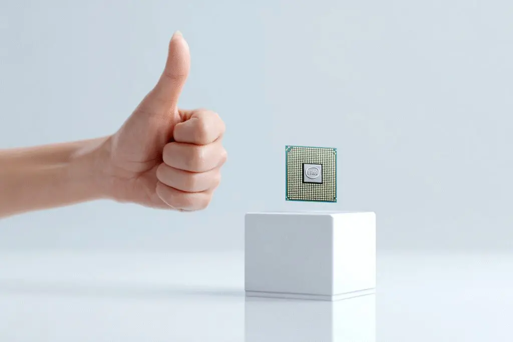 A hand giving a thumbs-up to a CPU answering the FAQ is i5-12400F good for gaming A hand giving a thumbs-up to a CPU answering the FAQ is i5-12400F good for gaming