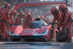 A pit crew upgrading a race cars engine chip a metaphor for how to update AMD drivers