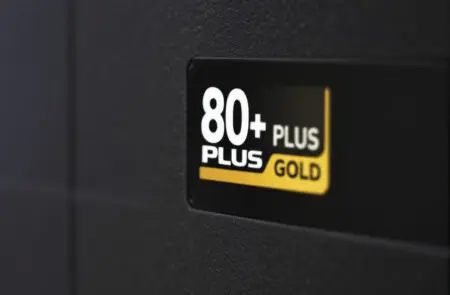 a close-up of the 80 plus gold logo on a psu representing the 80+ psu rating for energy efficiency