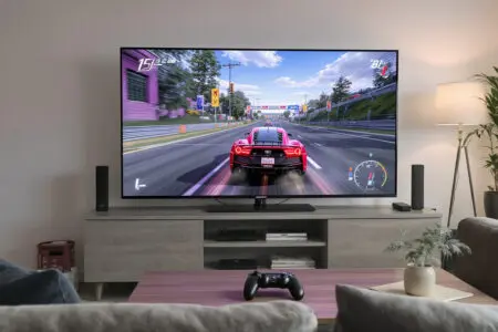 a living room with a console and tv showing a smooth game illustrating the 120hz console gaming sweet spot