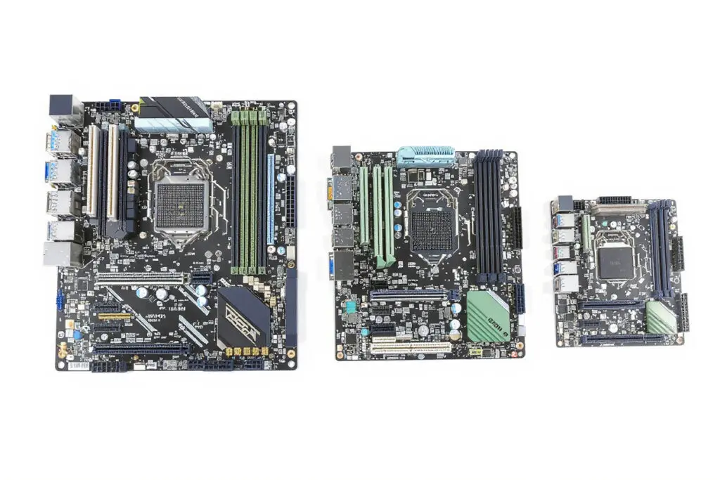 three motherboards of varying sizes=