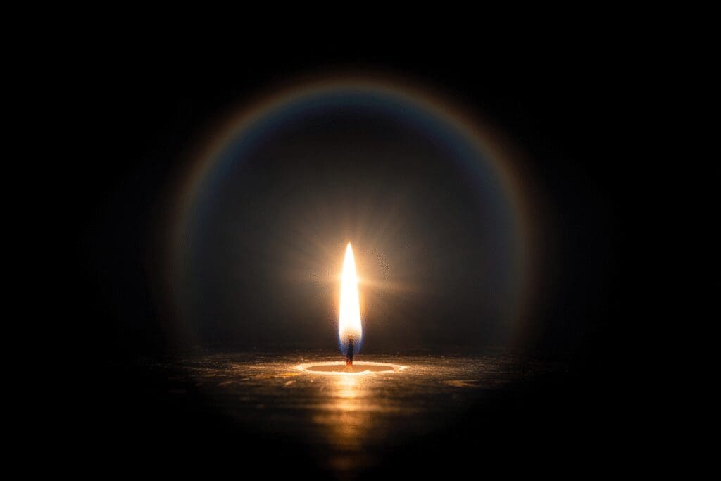 A candle flame with a soft halo illustrating the answer to the FAQ on what is bloom in games