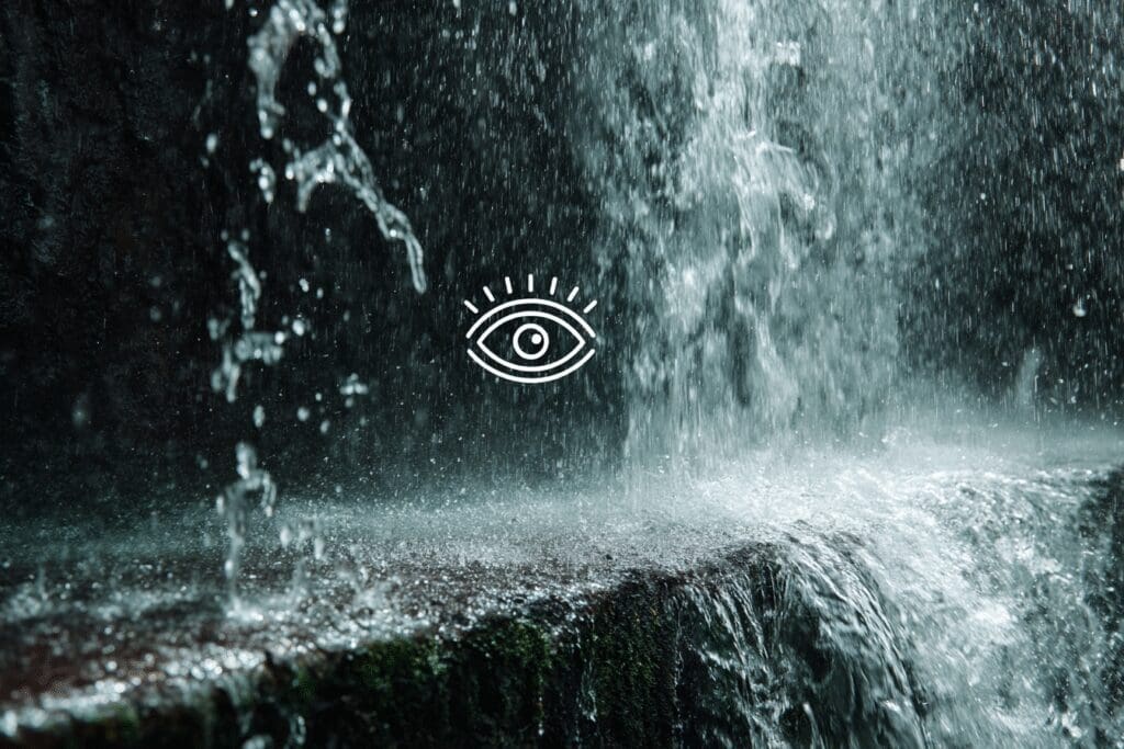 An eye looking at a waterfall that is both choppy and smooth illustrating the FAQ on how many FPS can the eye see