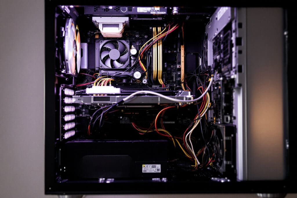 a photo from inside a pc showing how a psu connects to and powers all the components